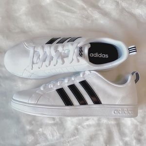 white adidas sneakers with black stripes
